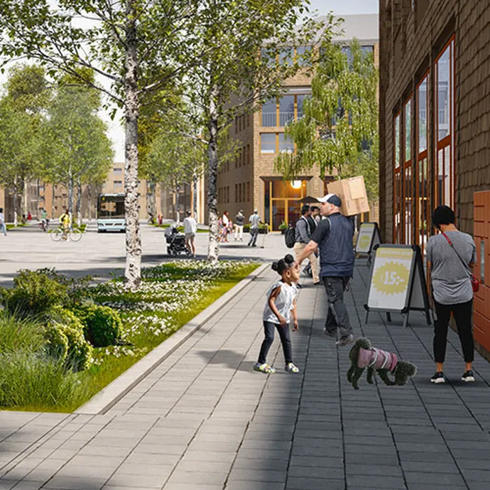Personer som rör sig på gatan vid centrala stråket på Tomtebo strand.