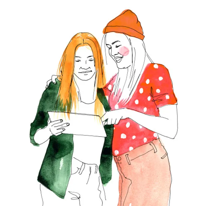 Two people are standing and talking to each other.