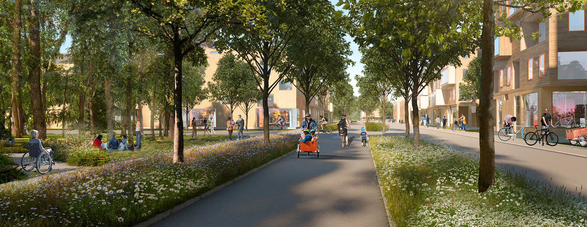 A person is cycling with children in a bike trailer past a park.