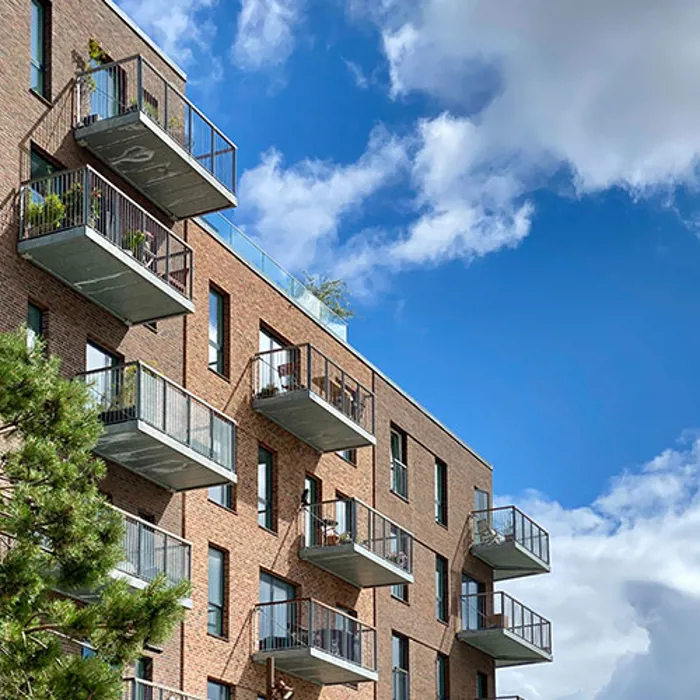 Multi-family residential buildings with a blue sky